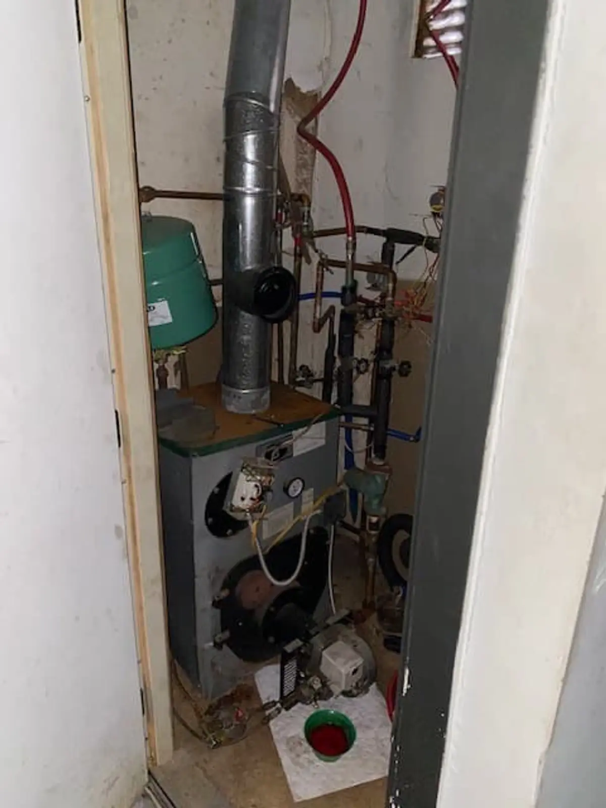 Downsizing or retiring in Middle Island: old boiler squeezed into a utility closet